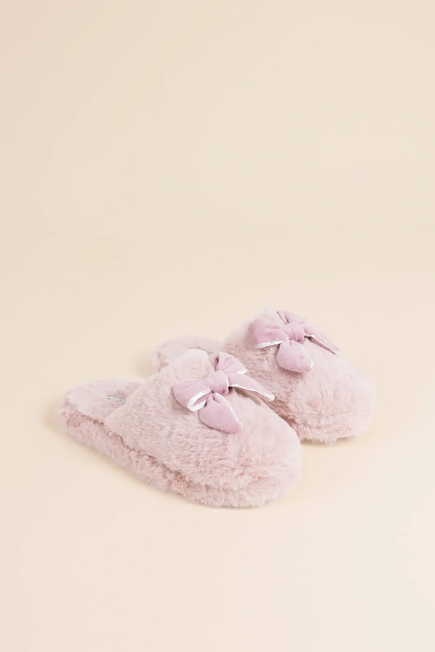 Pantofola invernale donna in eco-pelliccia articolo bow